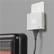 子機の電源遮断装置「シャットさん」。親機からの通知で、電気器具の電源を自動的に遮断して電気火災を防ぐ