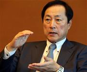 政治献金再開の理由を説明する、みずほフィナンシャルグループの佐藤康博社長