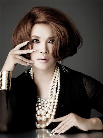 美容家、ＩＫＫＯ（いっこー）さん。逆境こそチャンス。強く凛として美しさで乗り越えて（「ＩＫＫＯのちょっと開運」（リンダパブリッシャーズ刊）から宮崎貢司さん撮影）