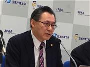 日本弁理士会の活動について説明する伊丹弁理士会長＝東京・霞が関の日本弁理士会