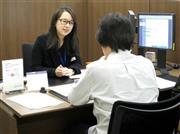 日銀のマイナス金利導入で住宅ローン金利を引き下げた新生銀行＝２０１６年２月１２日、東京都中央区（佐久間修志撮影）