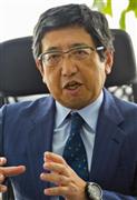 シンガポールでインタビューに答えるＡＭＲＯの根本洋一事務局長（共同）