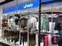 スポーツ用品が並ぶアシックスストア大阪。リオ五輪の開幕が近付くと商戦も熱を帯びそうだ＝大阪市北区