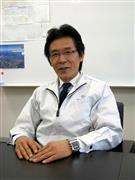 インタビューに応じるナノフュエルの松村健彦社長＝川崎市川崎区の同社