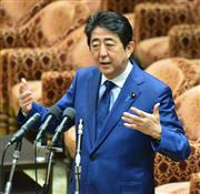 衆院予算委員会で民主党の岡田克也代表の質問に答える安倍晋三首相＝２９日午前、衆院第１委員室（斎藤良雄撮影）