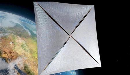 帆を広げて進む探査機「ナノクラフト」の想像図（ロイター＝共同）