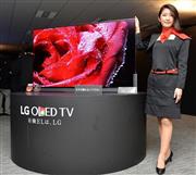 ＬＧエレクトロニクス日本法人が有機ＥＬテレビの新製品を発表した＝１３日午後、東京都中央区