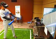 ＮＴＴが研究するＡＩ技術の一種で、「スポーツで勝てる脳」のメカニズムを解明するための実験システム。ＶＲ（仮想現実）の技術も応用する＝３０日、東京都千代田区