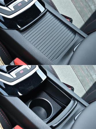 センターコンソールのシャッター付きカップホルダーは１つだけだが、蓋付き容器ならドアポケットにも収納可能。プジョー・３０８ＧＴｉ