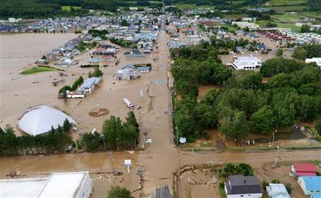 空知川の堤防が決壊し浸水した北海道南富良野町幾寅地区＝３１日午前（北海道開発局提供）
