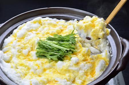 〆はメレンゲと卵黄をからめたみかん雑炊