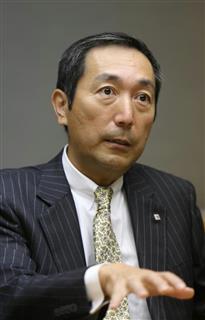 インタビューに応じるサッポロビールの尾賀真城社長＝２２日、東京都渋谷区