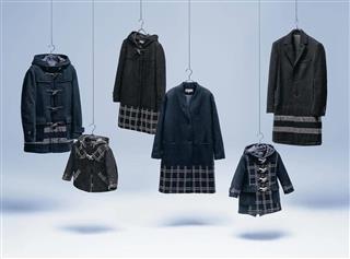 織物産地、新潟県見附市の職人と開発したウールにナイロン糸を織り込んだジャカード織のコート