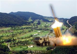 ＴＨＡＡＤ（ロイター）の配備先に選定された韓国・慶尚北道星州郡のゴルフ場（聯合＝共同、合成写真）