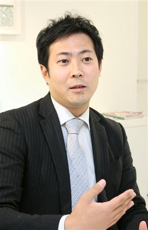 岡益充執行役員