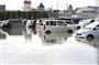 大雨で冠水した駐車場＝１４日午後１時、愛知県大口町