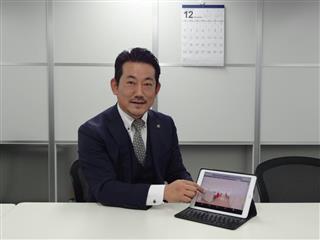 新サービスを説明するオフィスナビの金本修幸社長＝東京都千代田区