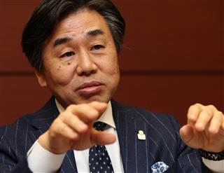「２０５０年に脱炭素を目指すなら、今すぐ環境配慮型住宅やスマートタウンの開発に取り組まないと間に合わない」と語る積水ハウス常務執行役員の石田建一氏