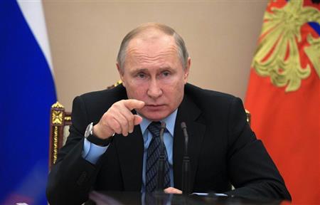 ロシアの首都モスクワで行われた閣僚会議で議長を務めたプーチン大統領＝１月１６日（ＡＰ）