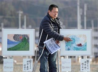 避難を呼びかける看板や石碑を建てる活動を続ける木村正明さん＝１０日午後、岩手県釜石市（桐山弘太撮影）