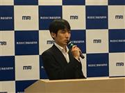 三菱総合研究所の武藤正紀主任研究員。「無人運航船は日本を変える重要な要素」と強調する