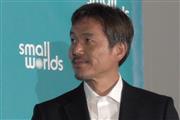 株式会社SMALL WORLDS 執行役員の山田俊太朗氏。山田氏は「第3新東京市のマンションに“住む”ことも可能」と具体的に入場者へのメリットをアピール