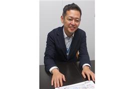 「ご近所ワーク」の仕組みを説明する、ビースタイルの中村浩史・執行役員＝東京都新宿区