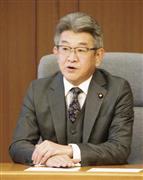 　防衛相の臨時代理として自衛隊行動命令を出した武田国家公安委員長＝１５日午後、防衛省