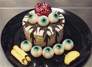 「中西怪奇菓子工房。」の脳みそ目玉ケーキなどの商品＝大阪府豊中市