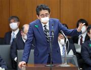 衆院厚生労働委員会で答弁を行う安倍晋三首相＝１７日午後、国会・衆院第１６委員室（春名中撮影）