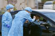 「ドライブスルー方式」で行われた、新型コロナウイルスの模擬検査＝２０日午後、奈良市内