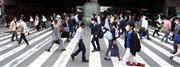 休業要請が段階的に解除される大阪の通勤風景＝１５日午前、大阪市北区