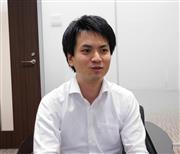 インタビューに答える東京商工リサーチ情報部の原田三寛部長