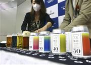ＮＥＣと協同商事が共同開発したビール「人生醸造クラフト」＝１５日、東京都内