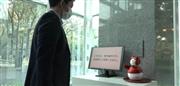 日立製作所はロボットなどの活用で接触機会を減らす新しい会議のあり方を提案している