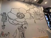 理美容専門卸問屋「ファイブ吉祥寺店」の入り口の階段のスペースの壁画＝東京都武蔵野市吉祥寺本町