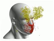 不織布マスクを着けてせきをした際のシミュレーション画像。飛沫のうち、黄色の点で示されているのは隙間から漏れた粒、青は素材を通り抜けて漏れた粒、赤は漏れずにマスク内や顔表面にとどまった粒を示す（理化学研究所・豊橋技術科学大・神戸大提供、京都工芸繊維大・大阪大・大王製紙協力）