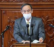 衆院本会議で答弁する菅義偉首相＝２１日午後、国会（春名中撮影）