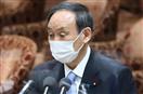 衆院決算行政監視委員会で答弁する菅義偉首相＝１２日午前、衆院第１委員室（春名中撮影）