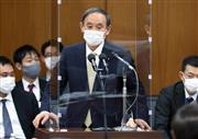 衆院厚労委員会で答弁する菅義偉首相＝２３日午後、衆院第１６委員室