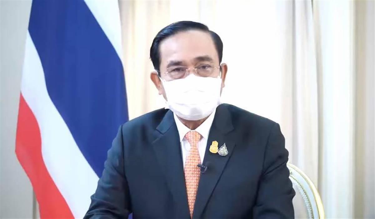 １０月までの国境再開を宣言するプラユット首相（テレビ放送から）