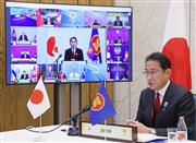 テレビ会議形式で開かれた、東南アジア諸国連合と日中韓（ＡＳＥＡＮプラス３）の首脳会合に臨む岸田文雄首相（内閣広報室提供）